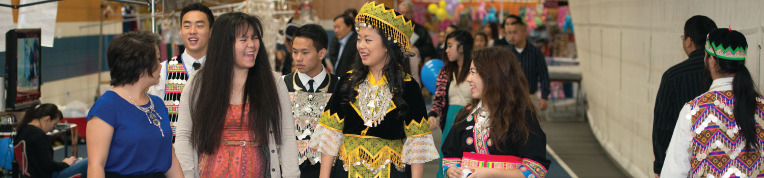 Students in traditional Hmong dress at a Hmong heritage event